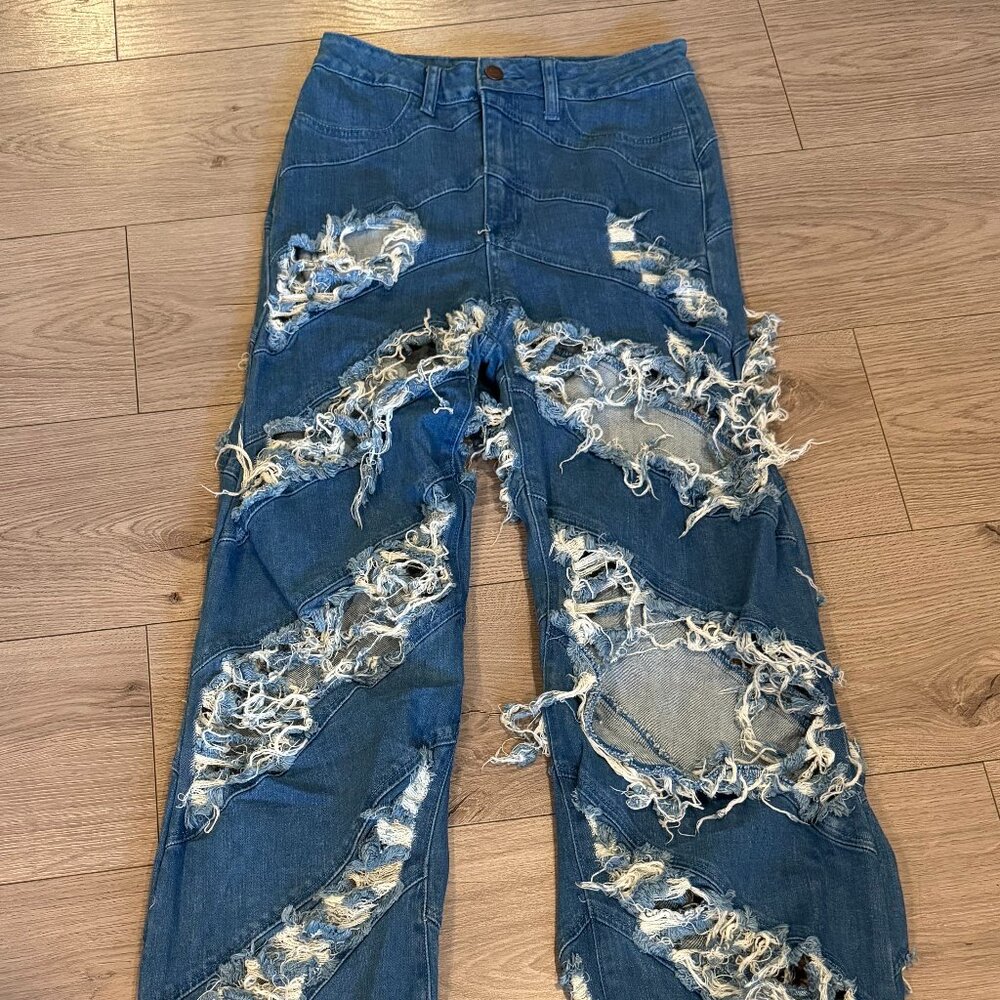 Heavily distressed jeans